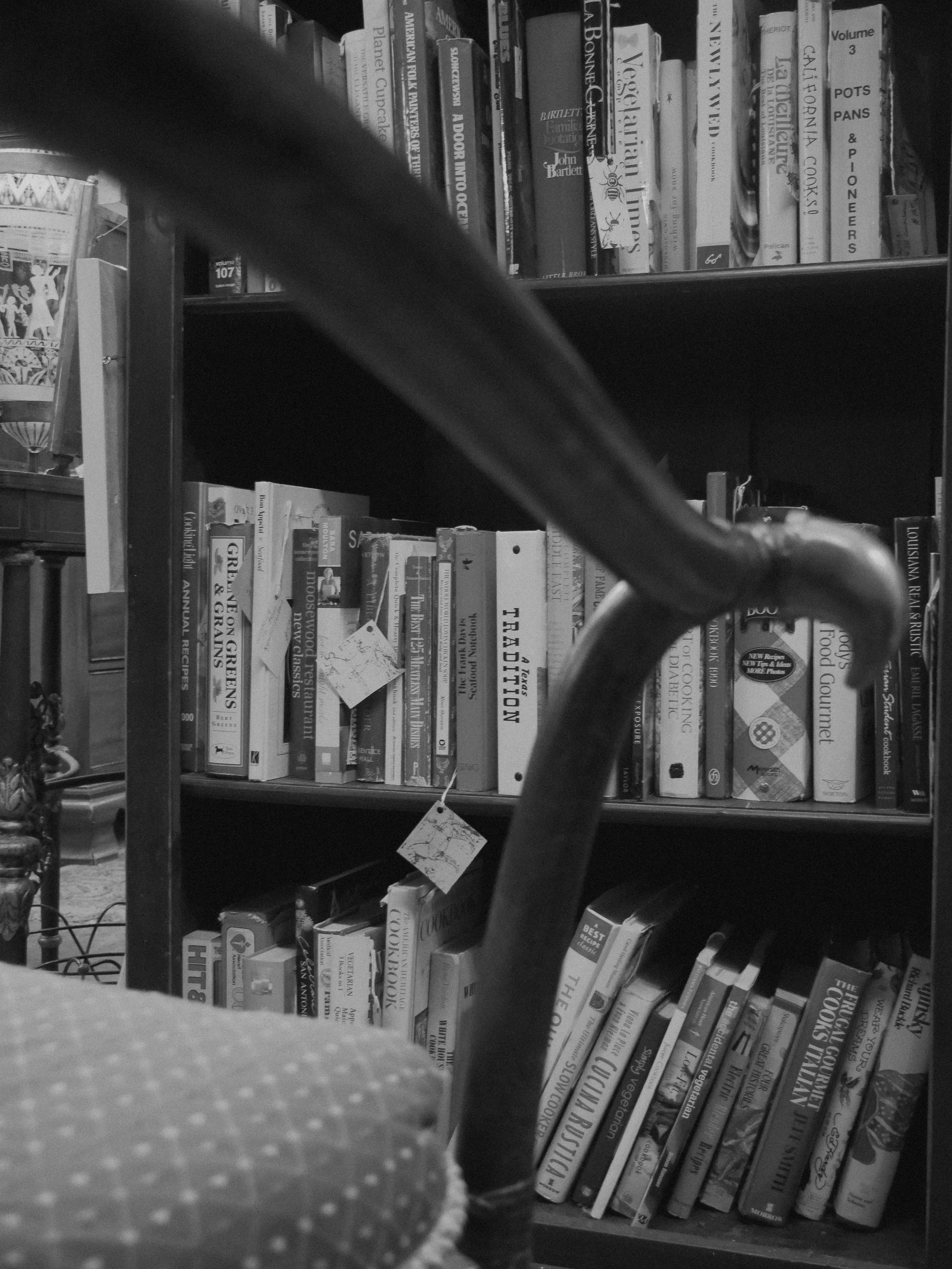 Monochrome editorial bookshelf composition